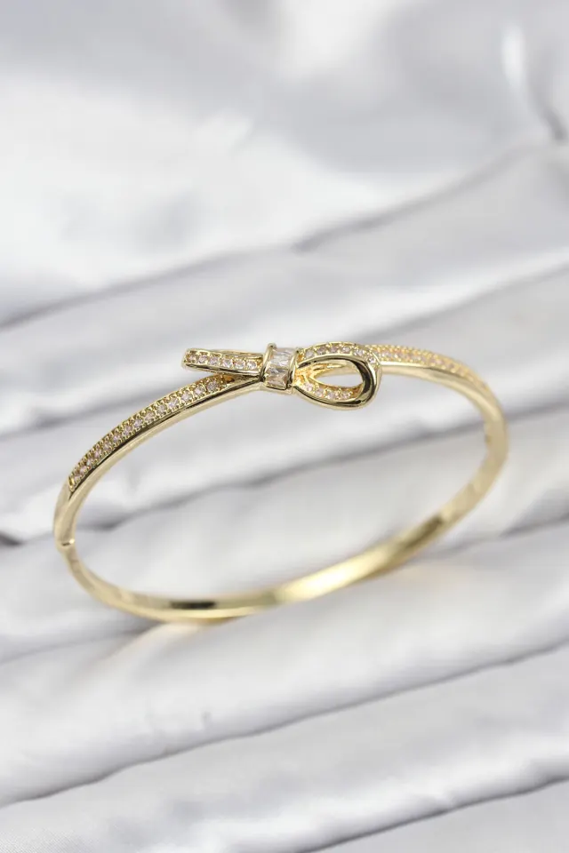Pirinç Gold Renk Zirkon Taşlı Fiyonk Model Kadın Kelepçe Bileklik