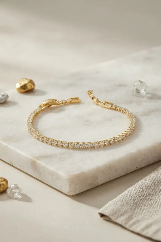 Pirinç Gold Renk İnce Zirkon Taşlı Su Yolu Kadın Bileklik